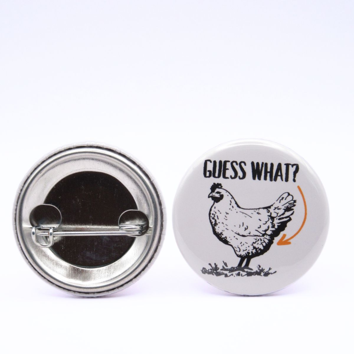 BooBooRoo Pinback Button (i.e. button, badge, pin) for the Guess What Chicken Butt, Guess Why Chicken Thigh, and Guess Who Chicken Shoe three-button pack. Image showing front and back of high-quality metal button.