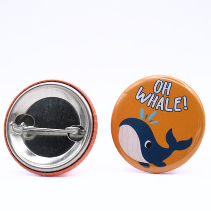 BooBooRoo Pinback Button (i.e. button, badge, pin) of a whale saying, "Oh Whale!" Image showing front and back of high-quality metal button.