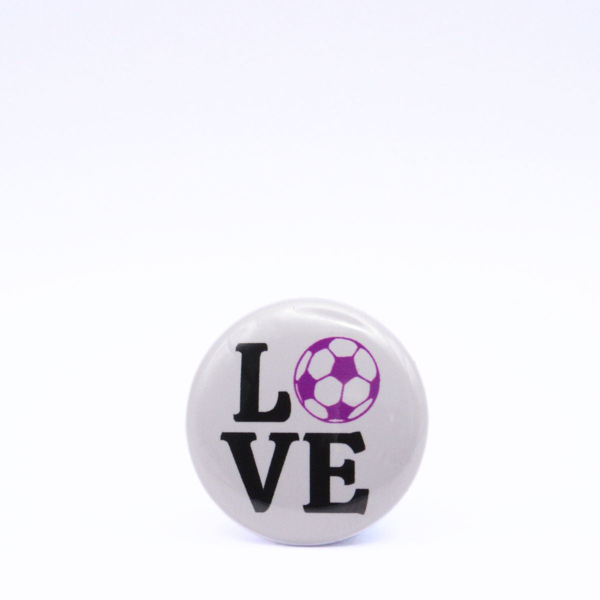 BooBooRoo Pinback Button (i.e. button, badge, pin) displaying the word "Love" with the "O" replaced by a soccer ball. Purple soccer ball with black text.
