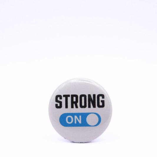 BooBooRoo Pinback Button (i.e. button, badge, pin) displaying strong mode is on. Blue background for mode indicator.