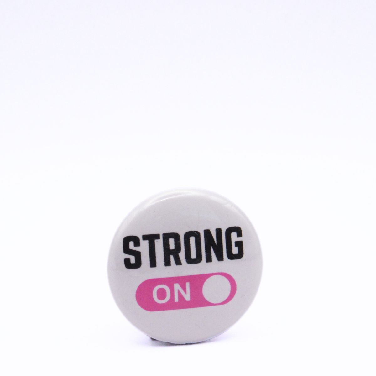BooBooRoo Pinback Button (i.e. button, badge, pin) displaying strong mode is on. Pink background for mode indicator.