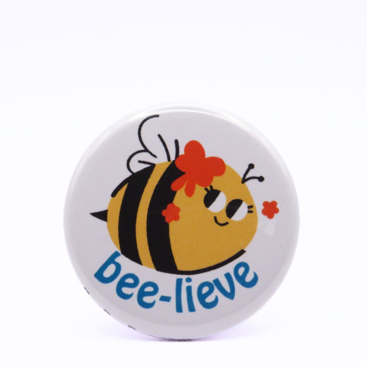 BooBooRoo Pinback Button (i.e. button, badge, pin) of a Cute Kawaii Style Bee with the pun Bee-lieve.